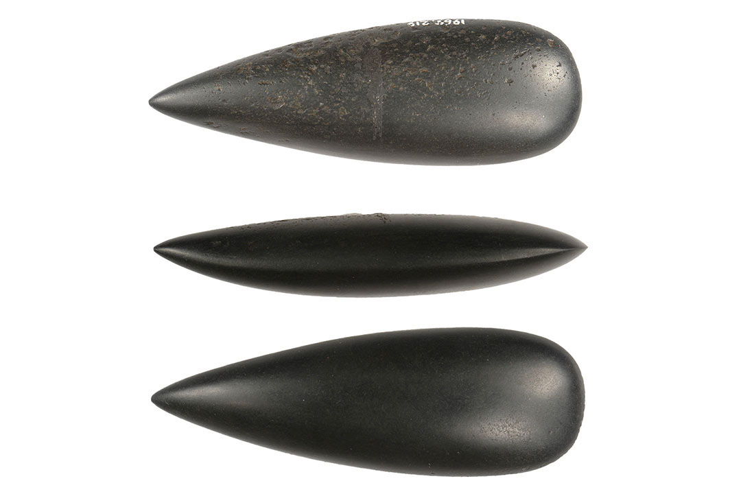 stone axe head, top and both side views