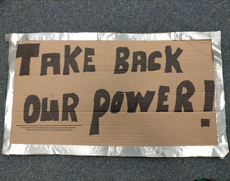 Take back our power sign 