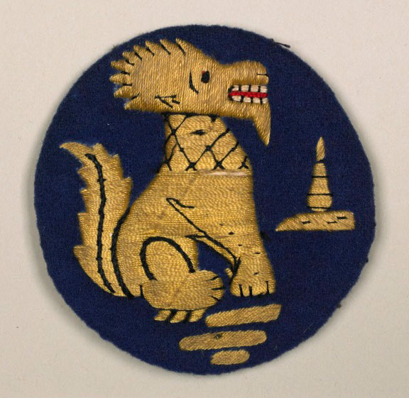 Woven badge with mythical beast