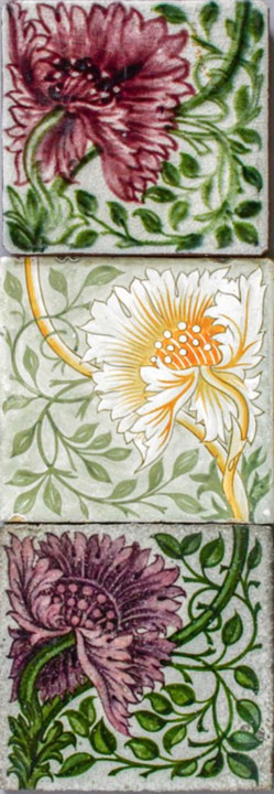 Three decorative tiles with poppy design