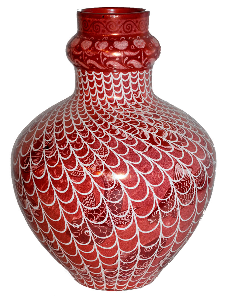 vase with picture of fish underneath a spiralling net pattern