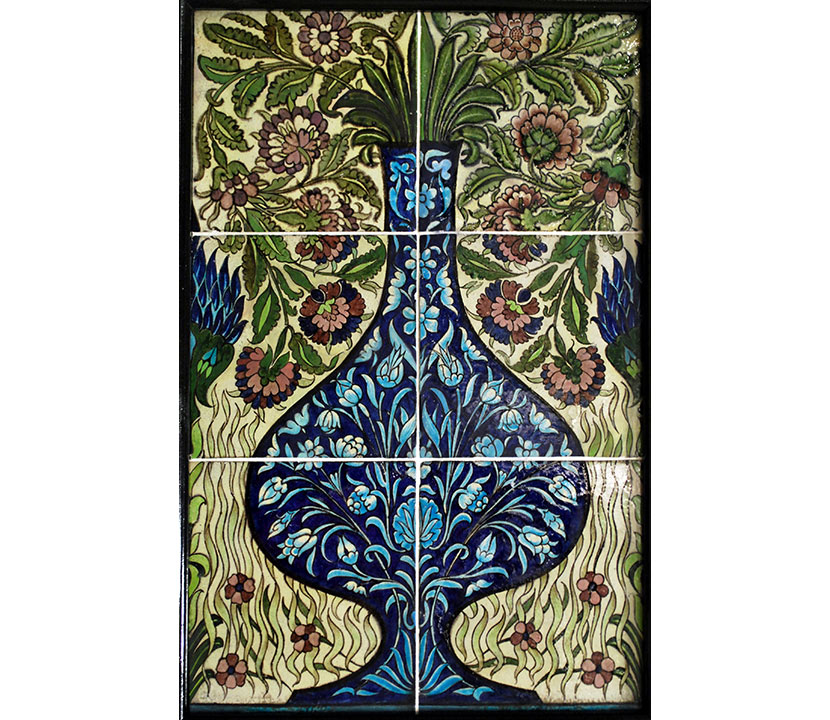 Highly patterned tiled panel with image of a vase of flowers
