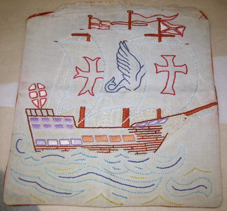 sailing ship embroidered on a cushion cover