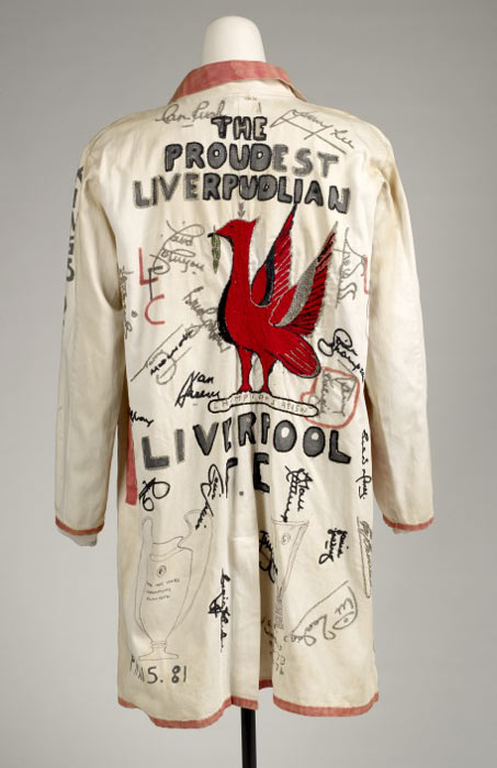 long white coat decorated with Liverpool Football Club images and phrases