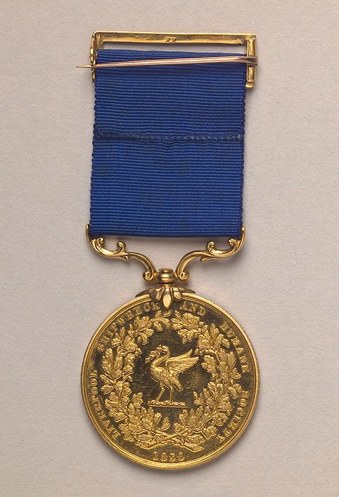 gold medal featuring liver bird