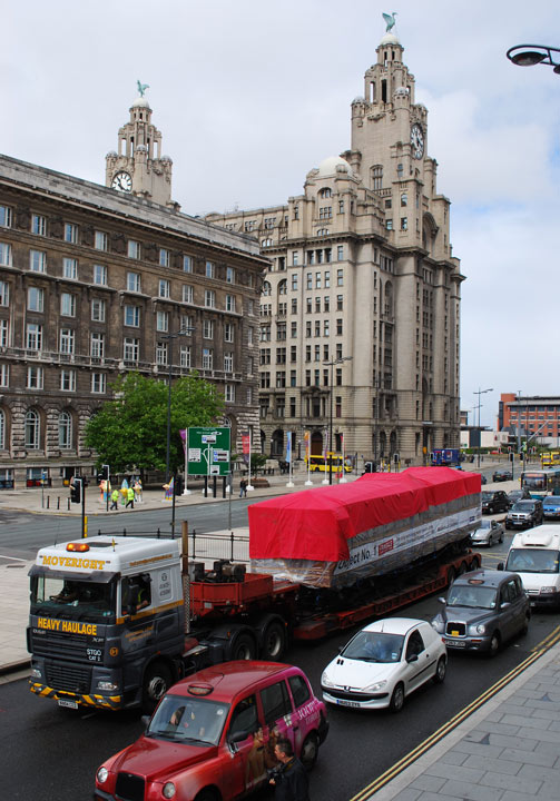 railway carriage on a truck on Liverpool's Dock Road by the Liver Building