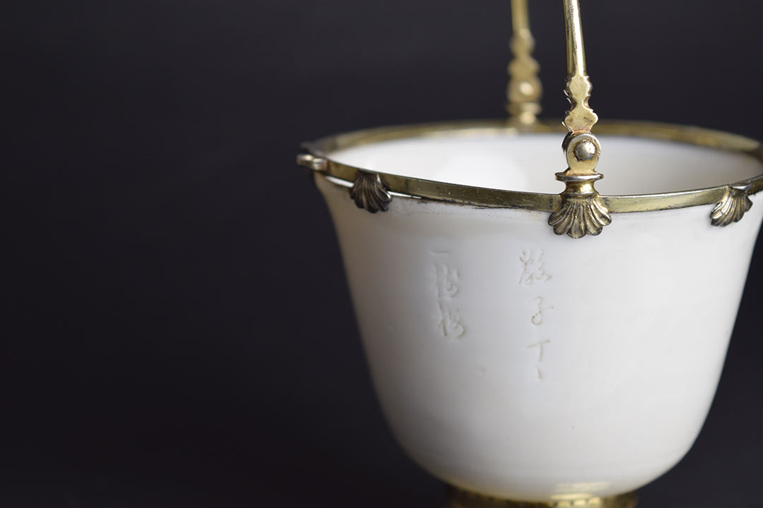 delicate porcelain cup with handle