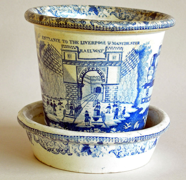 ceramic pot decorated with railway scene