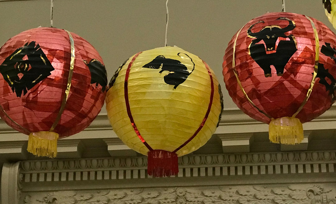 Chinese lanterns, one with a rat on it