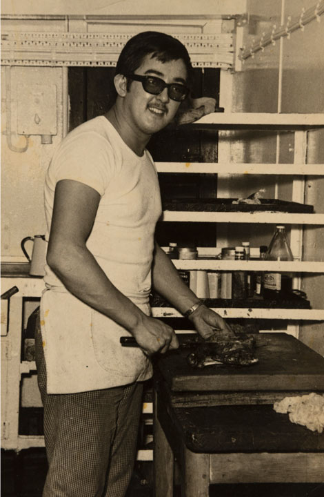 Robert Ng preparing food on board a ship