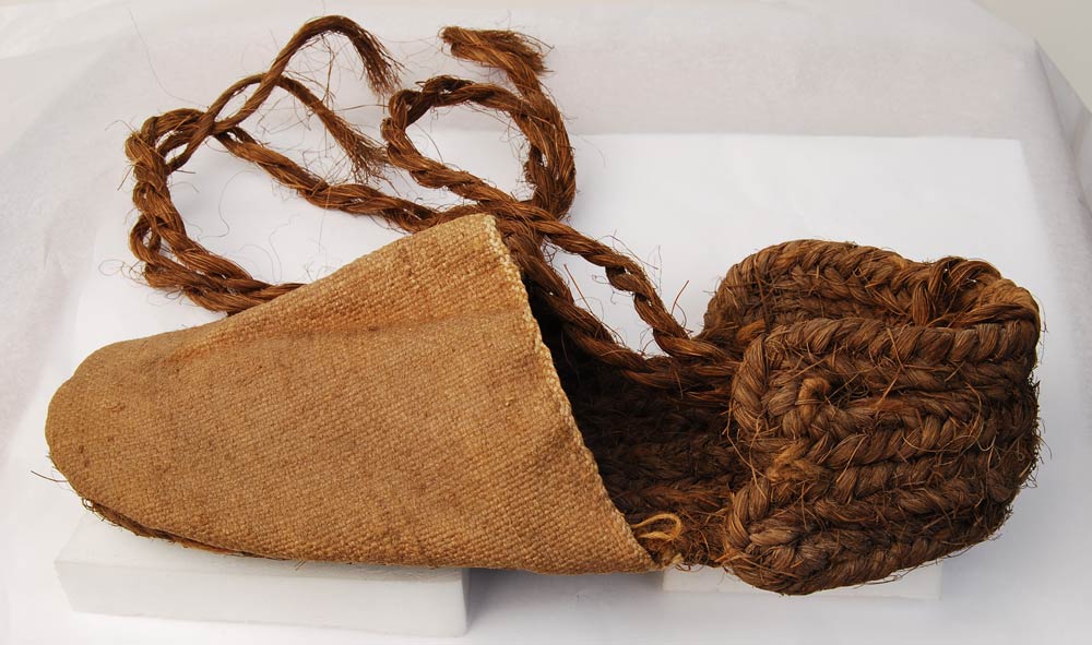 fabric shoe with sole made from coiled rope